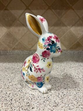 Laura Ashley floral ceramic bunny figurine featuring gold accents on the ears